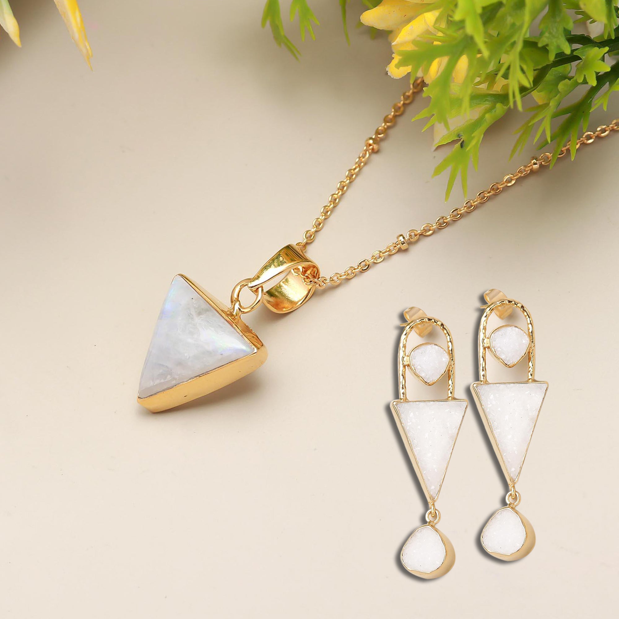 Pair up Triangular Melody pendant set with Lush Blossom earrings