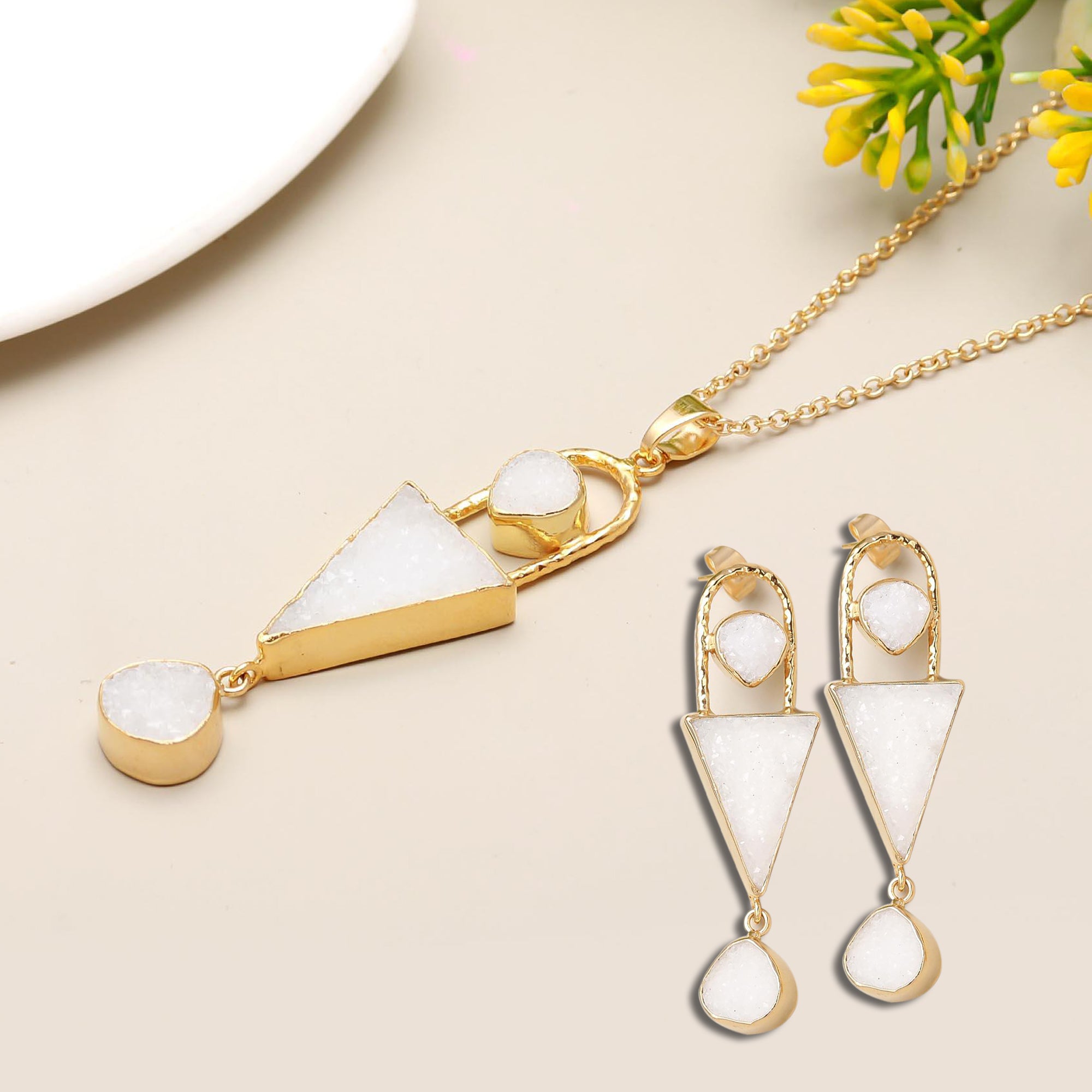 Pair up Lush Blossom geometric style pendant with earrings
