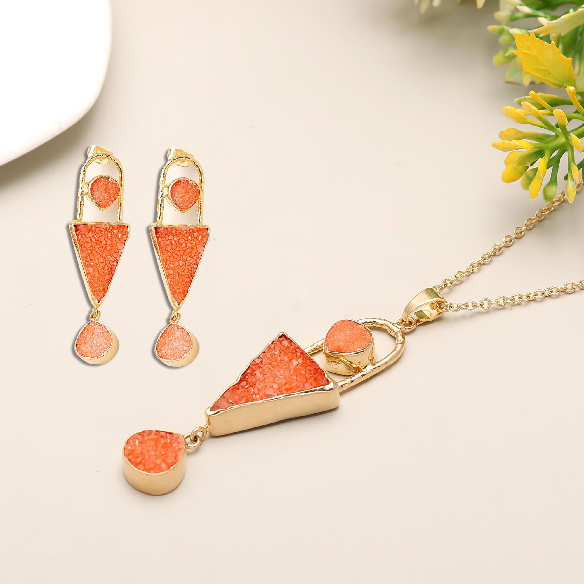 Pair up Lush Blossom geometric style pendant with earrings